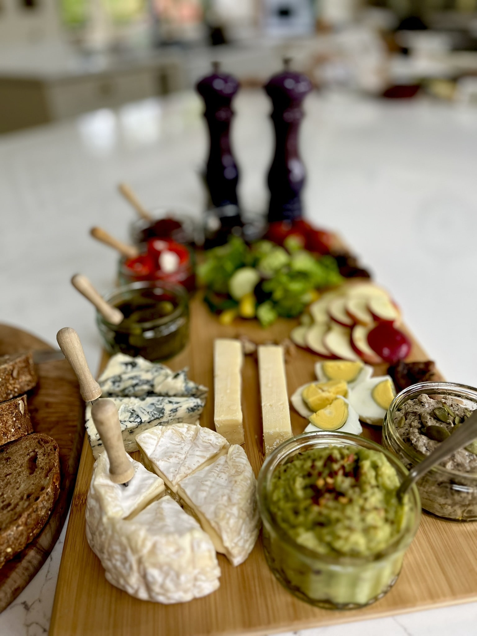 Buffet, containing Assortment of Cheeses, Fruit, Bread & Condiments