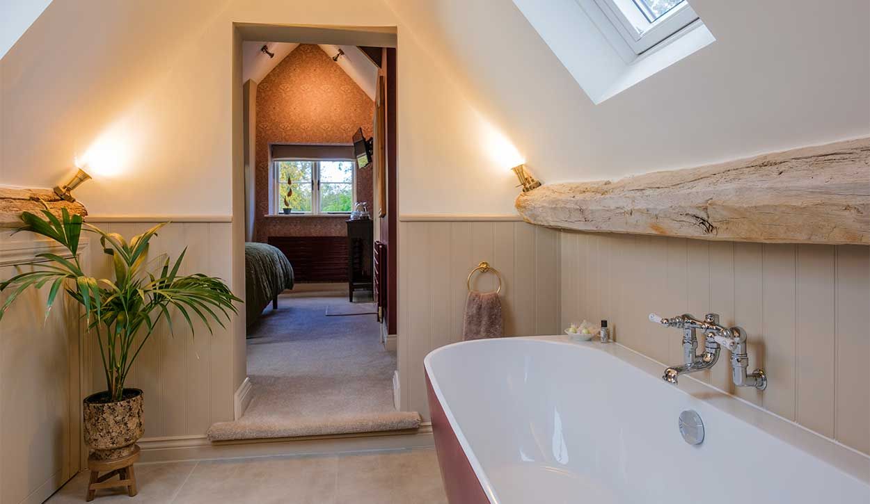 Orchard Room Bathtub With open Doorway in Background